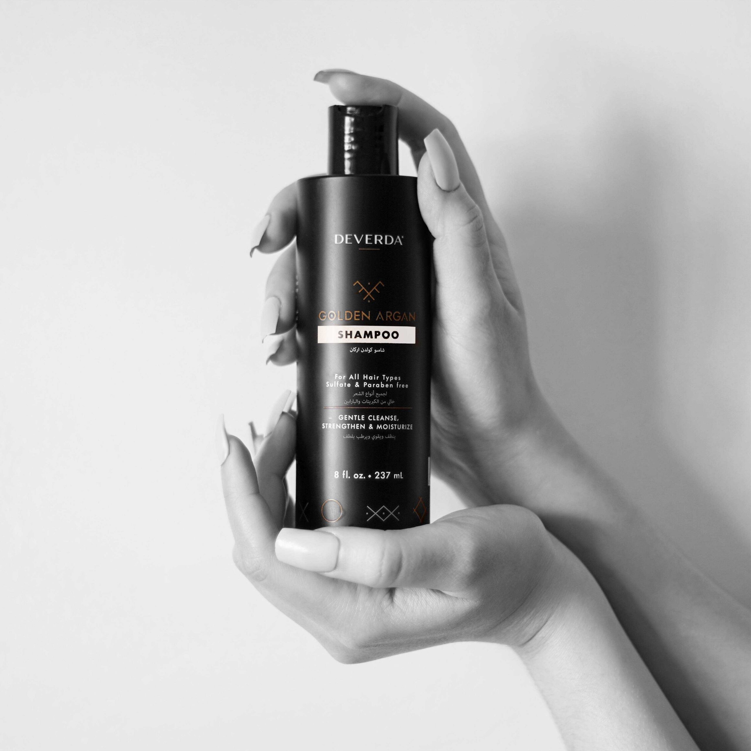 Shampoo in hand black and white 1